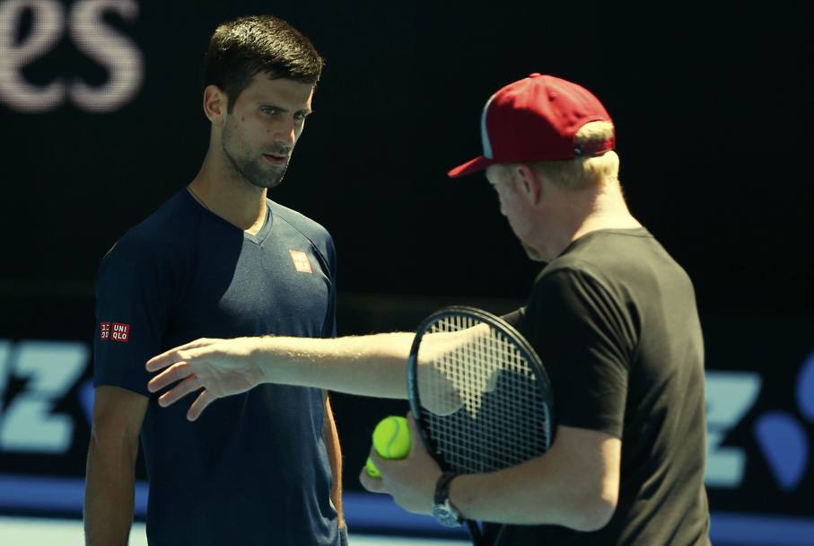 Novak Djokovic ascolta attentamente Boris Becker (Reuters)